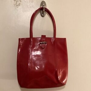 Longchamp
Roseau patent leather handbag